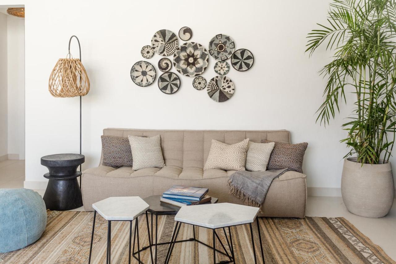 Cloud 7 Residences Ayla Aqaba Exterior photo A living room with a sofa