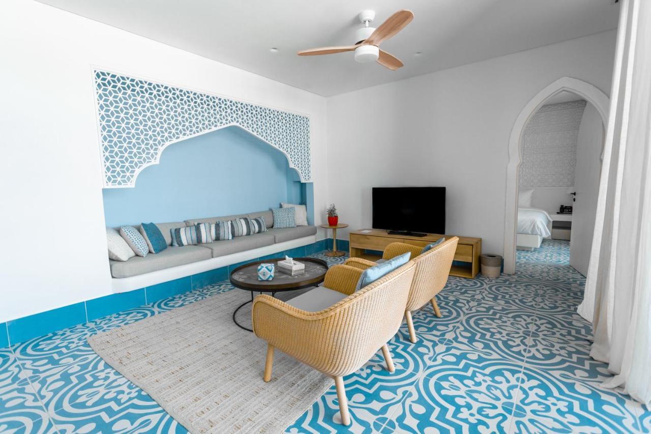 Cloud 7 Residences Ayla Aqaba Exterior photo A living room in a suite at the resort